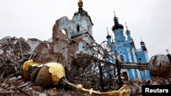 The Orthodox church of the Holy Mother of God-Joy of All Who Grieve lies in ruins in the village of Bohorodychne as a result of shelling amid Russia's attacks on Ukraine, March 18, 2023.
