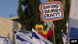 People protest against the Israeli government's judicial reform bill near the Knesset, Israel's parliament, in Jerusalem on Feb. 20, 2023.