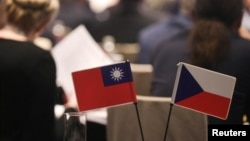 FILE - The national flags of Taiwan and Czech Republic are seen during a joint meeting in Taipei, Taiwan, March 27, 2023. 