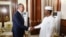 Russia's Foreign Minister Sergei Lavrov shakes hands with Chad's President Mahamat Idriss Deby during a meeting in N'djamena, Chad, June 5, 2024. 