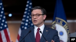 Speaker of the House Mike Johnson, R-La., talks with reporters following a closed-door Republican strategy session as Johnson pushes towards separate votes on aid for Israel and Ukraine, at the Capitol in Washington, April 16, 2024.