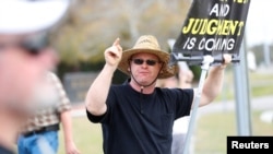FILE - An anti-abortion activist shouts at patients arriving at a health center in Clearwater, Florida, Feb. 11, 2023. The Florida Supreme Court this week issued two rulings that virtually guarantee that the issue of abortion will be top of mind for many voters in November.