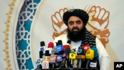 FILE - Amir Khan Muttaqi, the Taliban-appointed foreign minister, speaks at the Intercontinental Hotel, in Kabul, Afghanistan, Sept. 19, 2022.