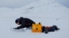 Paul Scherrer Institute Switzerland chemist Francois Burgay, 34, prepares to take a snow sample to detect molecules connected to algal bloom in Ny-Aalesund, Svalbard, Norway, April 5, 2023.