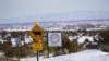 A road sign south of White Mesa, Utah, home to the Ute Mountain Ute Tribe. Utah is among several U.S. states that have banned ballot collection, posing a hardship to some Native American voters.