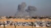FILE - Smoke rises following an Israeli airstrike east of Rafah, Gaza Strip, May 6, 2024. 