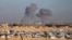 FILE - Smoke rises following an Israeli airstrike east of Rafah, Gaza Strip, May 6, 2024. 