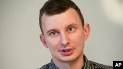 FILE - Ruslan Leviev, founder of the Conflict Intelligence Team, is pictured in Moscow, Feb. 14, 2018. A Moscow court sentenced Leviev and MIchael Nacke, a blogger, in absentia on Aug. 29, 2023, for distributing "fake" news about the war in Ukraine.