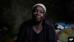 Malaria patient Funmilayo Kotun, 66, is photographed in her one room in Makoko neighborhood of Lagos, Nigeria, April 20, 2024.