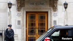 A taxi decorated with a Union Jack Flag passes by the London Clinic, where Britain's Kate, Princess of Wales, is hospitalized for abdominal surgery, in London, Britain, Jan. 17, 2024.