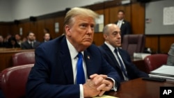 FILE - Former President Donald Trump sits in Manhattan criminal court during his trial in New York, April 22, 2024. (Angela Weiss/Pool Photo via AP)