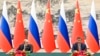 Xi, Putin pledge to deepen strategic ties at Beijing talks 