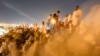 Muslim pilgrims converge at Mount Arafat for daylong worship