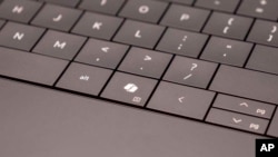 Microsoft's new Copilot key is seen on a Dell computer, next to the alt key, in this undated photo provided by AxiCom. (AxiCom on behalf of Dell Technologies via AP)