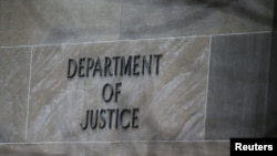 FILE - The U.S. Department of Justice building is pictured in Washington, March 21, 2019.