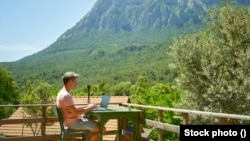 A poll of 2,000 employed Americans found that 29% had used their vacation travels as a chance to work remotely without telling their boss.