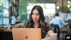 College graduate Angelina Chavez poses in San Jose, Calif., on May 22, 2024.