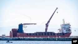 FILE - Russian vessel "Lady R" is docked at the Simon's Town Naval Base near Cape Town, South Africa, on Dec. 8, 2022.