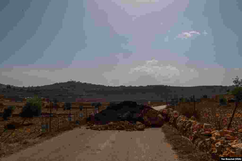 A road near the town of Qusra was blocked in the last week to help separate the town from a Jewish settlement nearby, in Qusra, Oct. 24, 2023. 