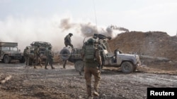 Tentara Israel beroperasi di Jalur Gaza di tengah konflik yang sedang berlangsung antara Israel dan kelompok Islam Palestina Hamas, dalam gambar selebaran yang dirilis pada 14 Desember 2023. (Pasukan Pertahanan Israel/Handout via REUTERS)