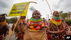 Protesters march in the streets of Nairobi, Kenya, to demand action on climate change as the Africa Climate Summit begins on Sept. 4, 2023.