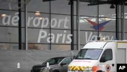 A rescue vehicle parks outside the Vatry airport, eastern France, Dec. 23, 2023, in Vatry, eastern France.