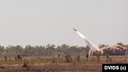 FILE - U.S. Army field artillery launches ATACMS in during military exercises in Australia, July 27, 2023.