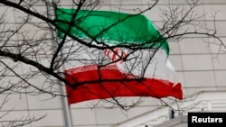 FILE - Iran's national flag is pictured at Iran's embassy to Germany in Berlin Dec. 1, 2011. 