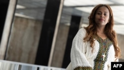 FILE - Meaza Mohammed of Ethiopia, a 2023 International Women of Courage Award recipient, poses at the State Department in Washington, March 9, 2023. 