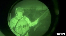 Yevgeny Prigozhin, founder of Russia's Wagner mercenary force, speaks in a video message that was allegedly filmed near the city administration building in Bakhmut, Ukraine, in this still image released April 3, 2023. (Concord Press Service/Handout via Reuters)