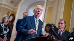 Senate Minority Leader Mitch McConnell, R-Ky., speaks to reporters at the Capitol in Washington, May 21, 2024.
