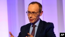 FILE - Pavel Butorin, husband of Russian-American journalist Alsu Kurmasheva, gestures during an interview with the Associated Press in Prague, Czech Republic, Nov. 10, 2023. 