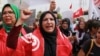 Tunisians protest as number of stranded migrants grows 