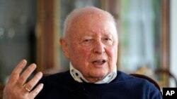Holocaust survivor Herbert Rubinstein talks during an interview with The Associated Press at his home in Duesseldorf, Germany, April 25, 2024. 