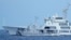 FILE - A Chinese coast guard ship blocks a Philippine coast guard ship as it maneuvers to enter the mouth of the Second Thomas Shoal, locally known as Ayungin Shoal, in one of the world's most hotly contested passages in the South China Sea, April 23, 2023. 