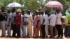 Voters wait to cast ballots at Karewa Primary School during Nigeria's presidential election in Yola, Nigeria, Feb. 25, 2023.