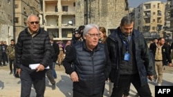 Martin Griffiths, U.N. Under-Secretary General for Humanitarian Affairs and Emergency Relief, visits affected neighborhoods in Aleppo, Syria, Feb. 13, 2023, following the devastating 7.8-magnitude earthquake that rocked Turkey and Syria. 