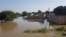 FILE - Homes are submerged in water after a massive flooding in N'djamena, Chad, October 14, 2022. Some 245,000 civilians are currently affected by floods in 13 of Chad's 23 provinces, according to officials.