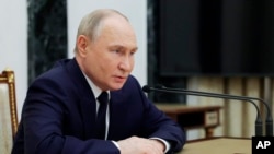 Russian President Vladimir Putin holds a meeting on development of Russia's military industrial complex, at the Kremlin in Moscow, May 15, 2024. (Gavriil Grigorov, Sputnik, Kremlin pool photo via AP)