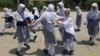 Students enjoy break time on May 27, 2023 at the Tibetan Public School situated in the historic citadel of Hari Parbat Fort, in the Tibetan colony in Srinagar, Jammu and Kashmir, India. (Bilal Hussain/VOA)
