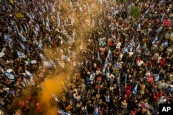 People gather in Tel Aviv, Israel, to demonstrate against Israeli Prime Minister Benjamin Netanyahu's government and call for the release of hostages held in the Gaza Strip by the Hamas militant group, May 4, 2024.