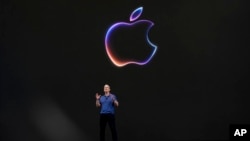 Apple CEO Tim Cook speaks during an announcement of new products on the Apple campus in Cupertino, Calif., Monday, June 10, 2024. (AP Photo/Jeff Chiu)