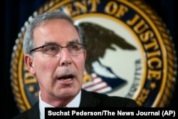 FILE - U.S. Attorney David Weiss speaks during a press conference on May 3, 2018, in Wilmington, Delaware.