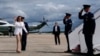 Democratic presidential nominee Vice President Kamala Harris, left, walks to board Air Force Two, Aug. 7, 2024, at Joint Base Andrews, Maryland, en route to Eau Claire, Wisconsin. 