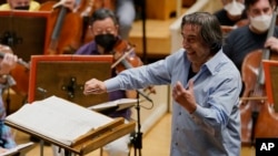 FILE - Italian conductor Riccardo Muti, 80, rehearses Verdi's "Un Ballo in Maschera (A masked Ball)" with the Chicago Symphony Orchestra in Chicago on Wednesday, June 22, 2022.