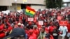 Thousands participate in a protest in Accra, Ghana, demanding the resignation of the Bank of Ghana's governor, Ernest Addison, Oct. 3, 2023.