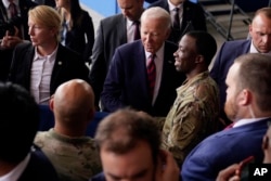 President Joe Biden greets service members at Joint Base Elmendorf-Richardson after he spoke to mark the anniversary of the Sept. 11 terrorist attacks, in Anchorage, Alaska, Sept. 11, 2023.