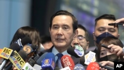 Former Taiwan President Ma Ying-jeou talks to the press before leaving for China at Taoyuan International Airport in Taoyuan City, Northern Taiwan, March 27, 2023.