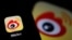 The logo of Chinese social media app Weibo is seen on a mobile phone in this illustration picture taken Dec. 7, 2021. 