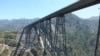 Chenab Rail Bridge, a 1.6-kilometer-long bridge, is nearly 366 meters tall and will be the tallest rail bridge in the world in Kashmir. (Bilal Hussain/VOA)